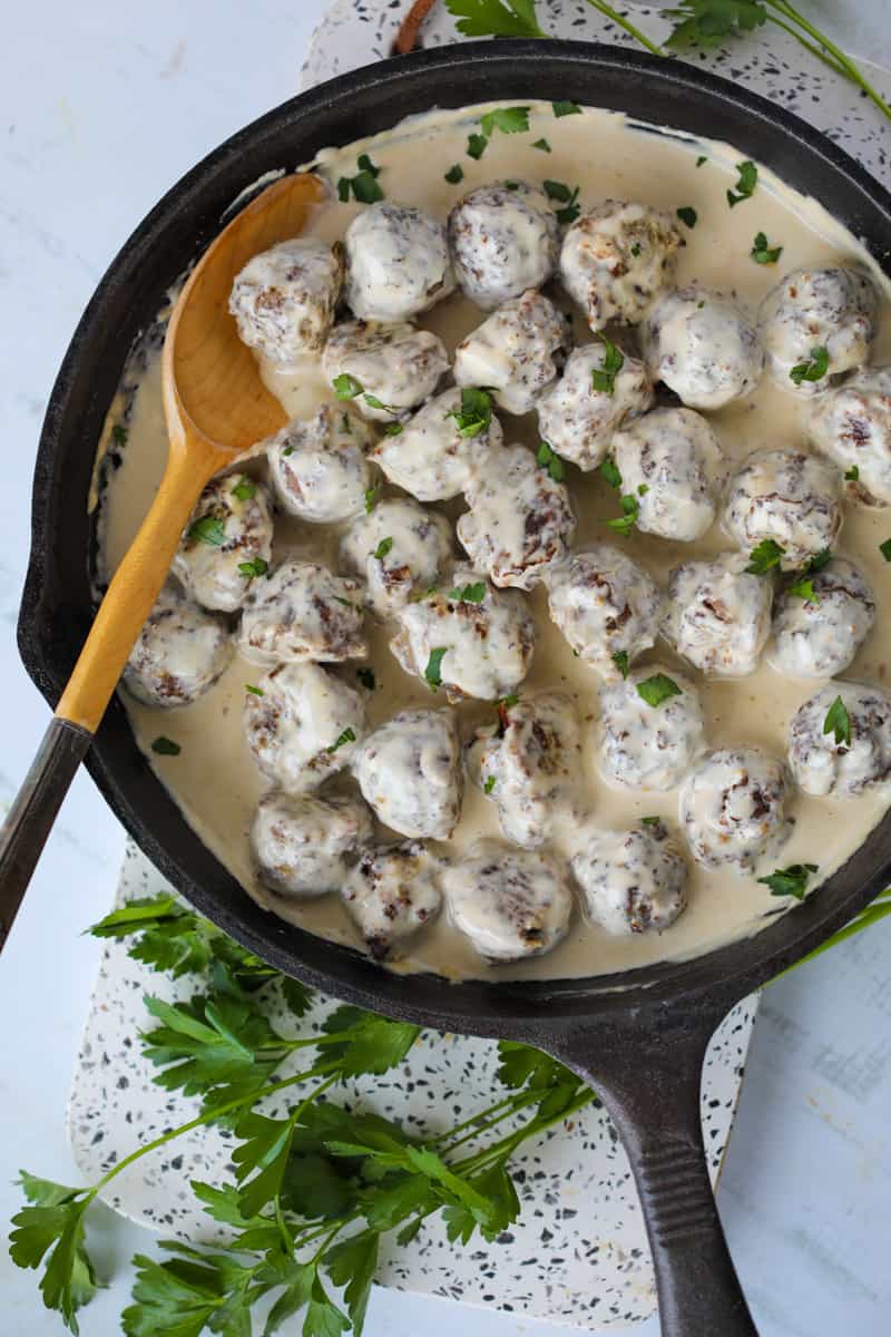 keto swedish meatballs top down view in a cast iron skillet