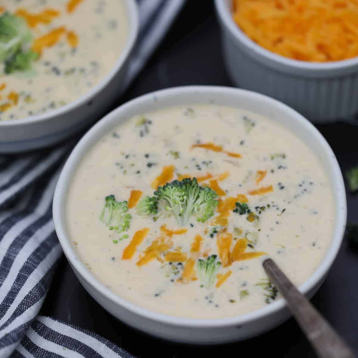 cheddar broccoli soup instant pot recipe closeup view with spoon