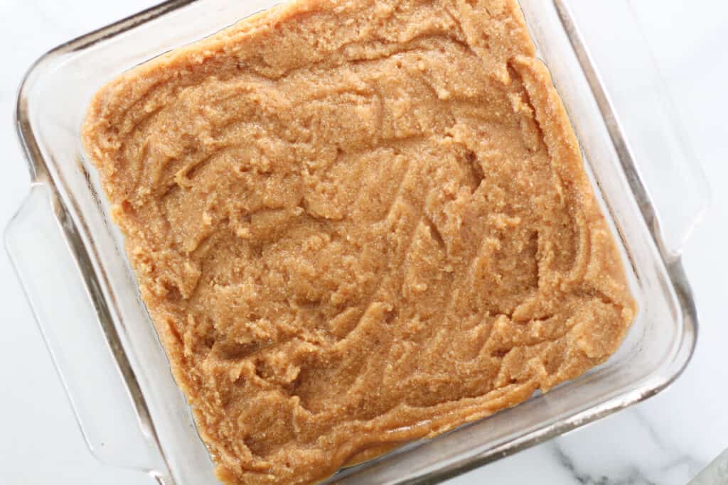 spread the almond flour blondies batter into a pan