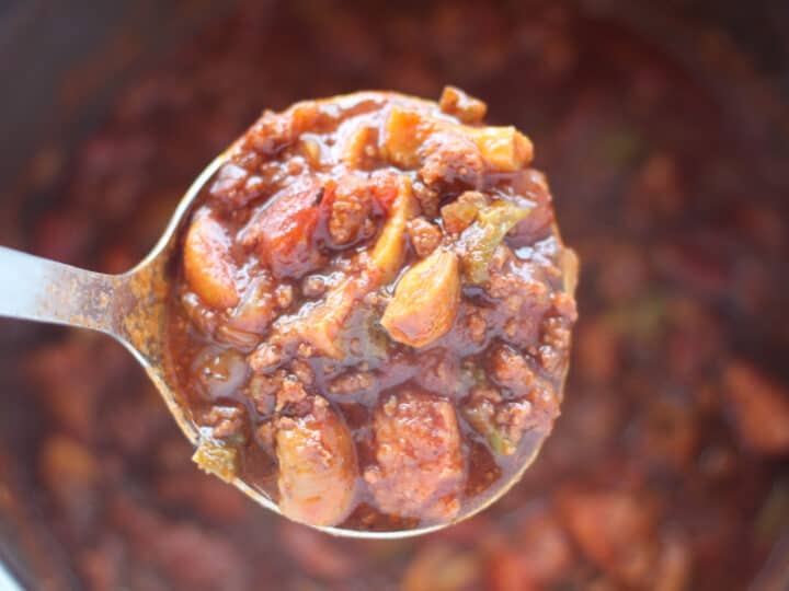 beanless chili on a spoon after cooking