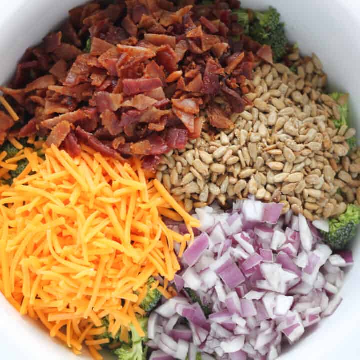 keto broccoli salad recipe with ingredients in a bowl before mixing