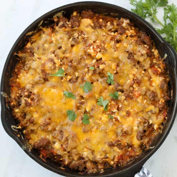 taco casserole keto in a skillet on a white background