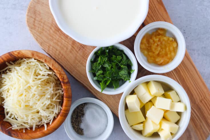 keto alfredo sauce ingredients on a cutting board