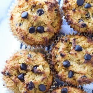 keto pumpkin muffins on a black and white towel top down