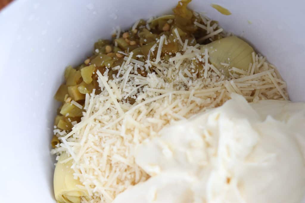 easy green chili dip recipe ingredients in a bowl