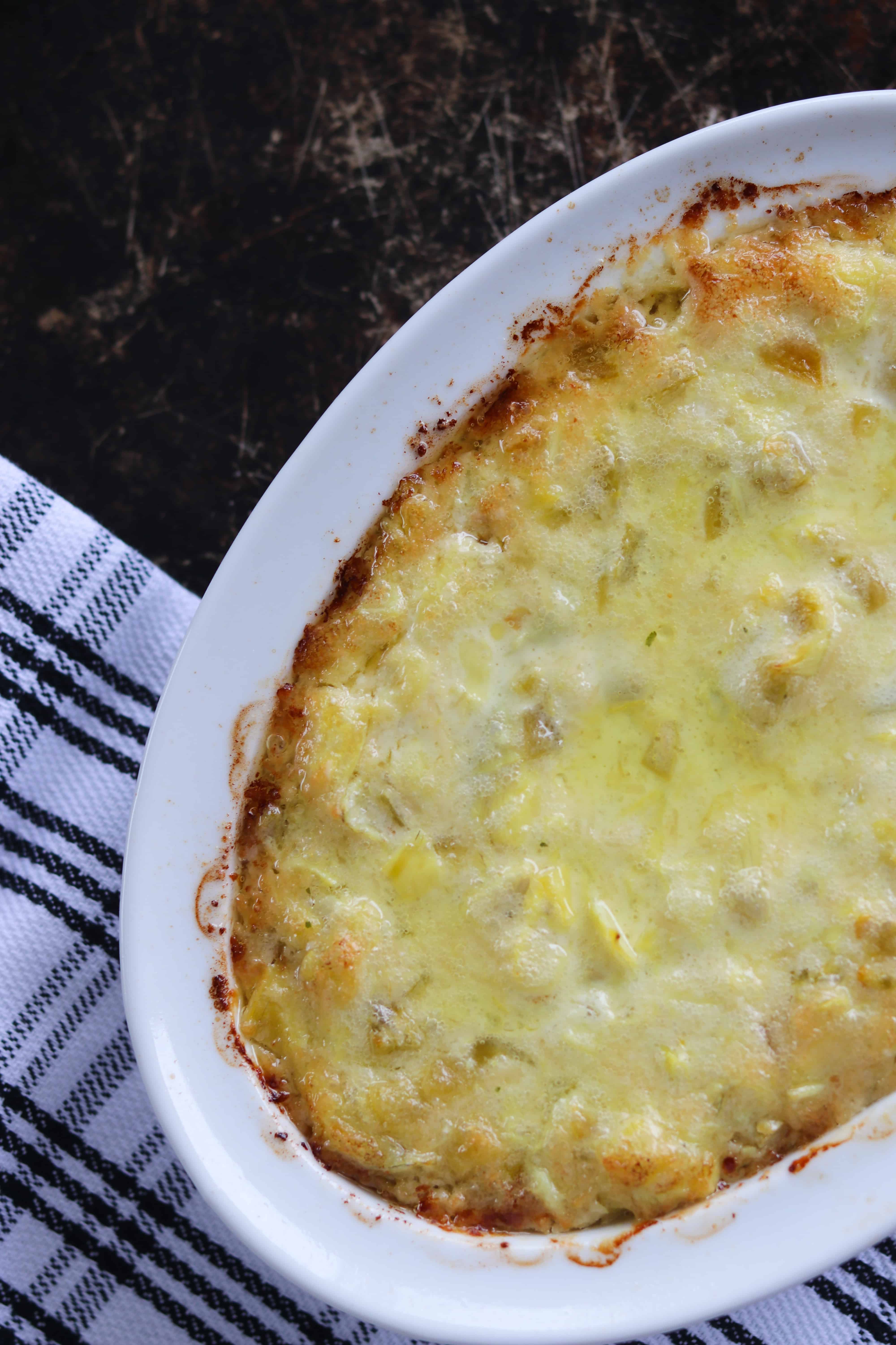 hot artichoke dip recipe just coming out hot from the oven