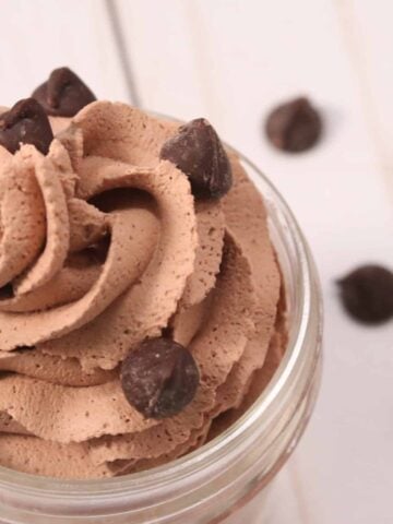 cream cheese keto dessert that's chocolate mousse in a jar with chocolate chips