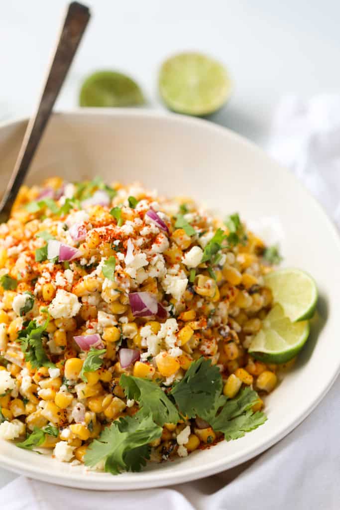 mexican street corn with frozen corn in a white bowl ready to serve