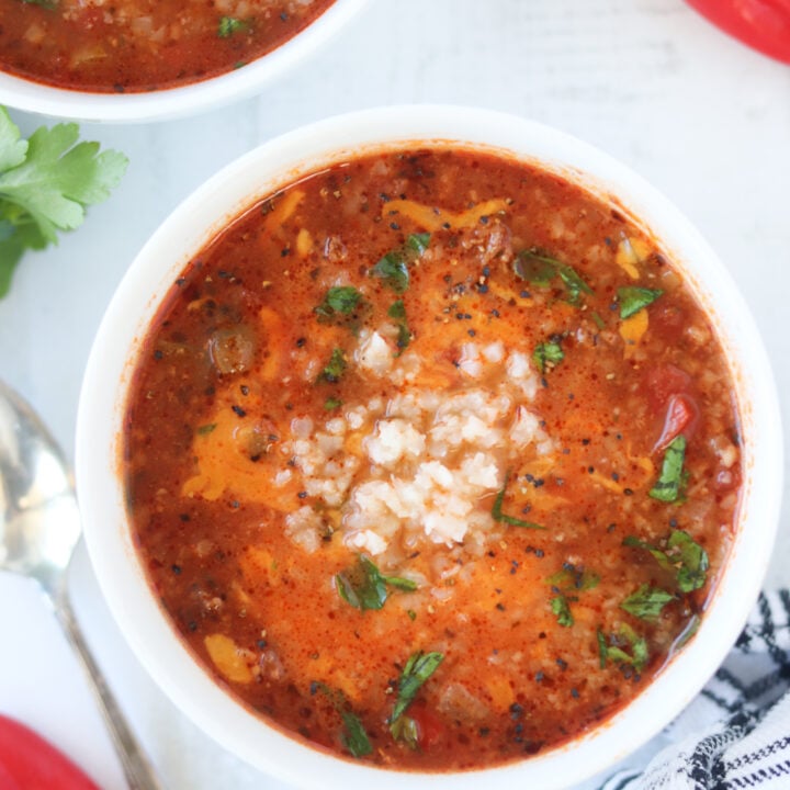 easy stuffed pepper soup crock pot recipe in a white bowl