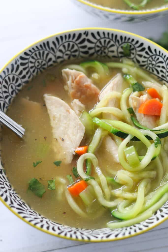 keto chicken soup recipe close up of the soup in a bowl