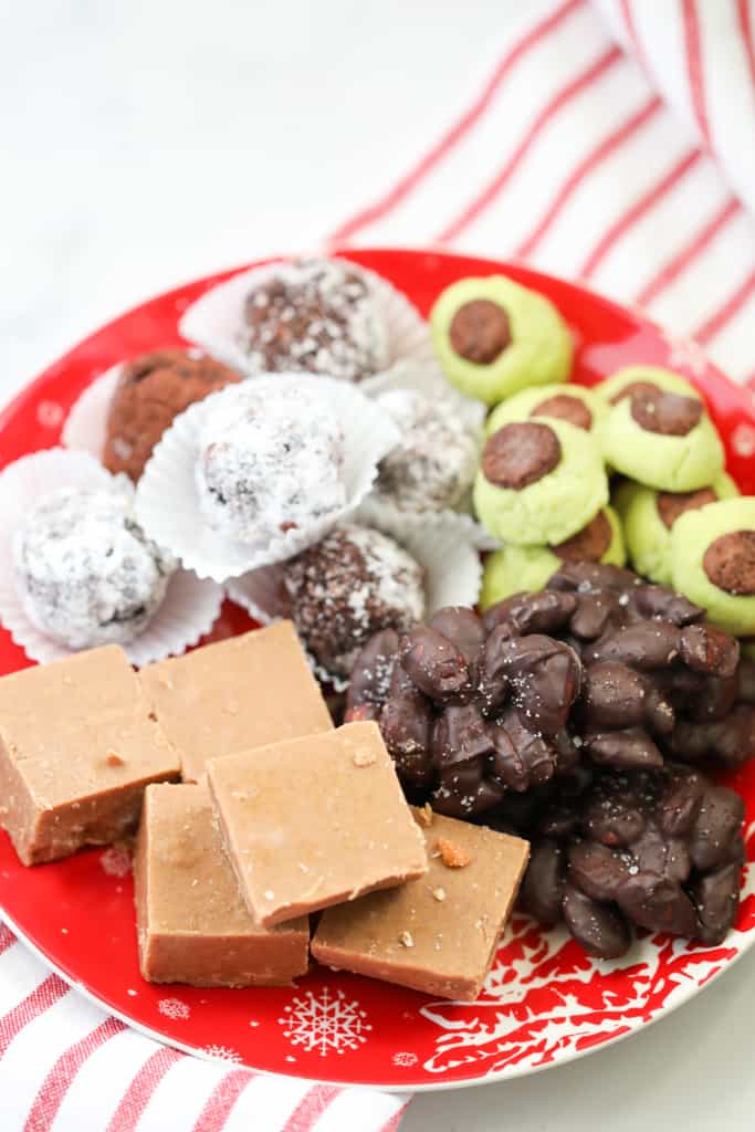 a variety of keto christmas cookies on a red plate