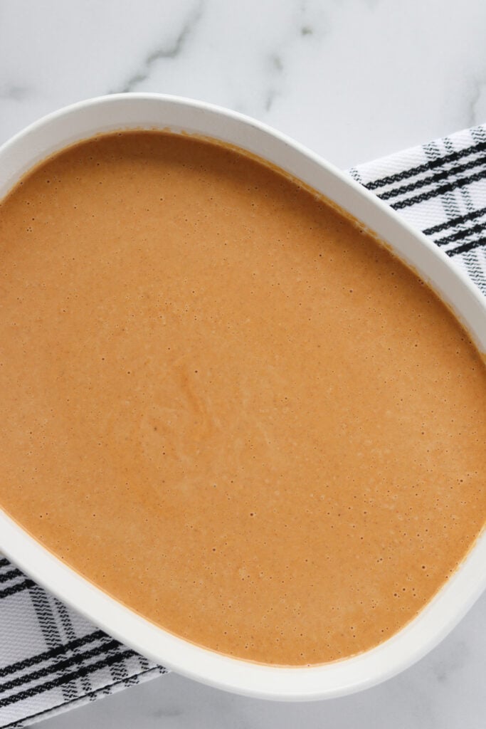 keto pumpkin pie crustless in a baking dish before baking