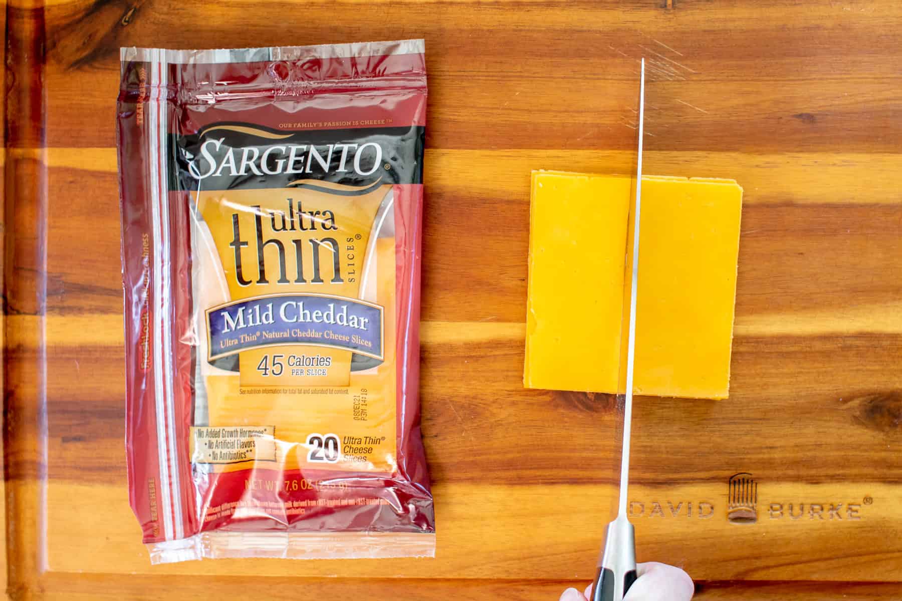 cut the large cheese slices into cubes