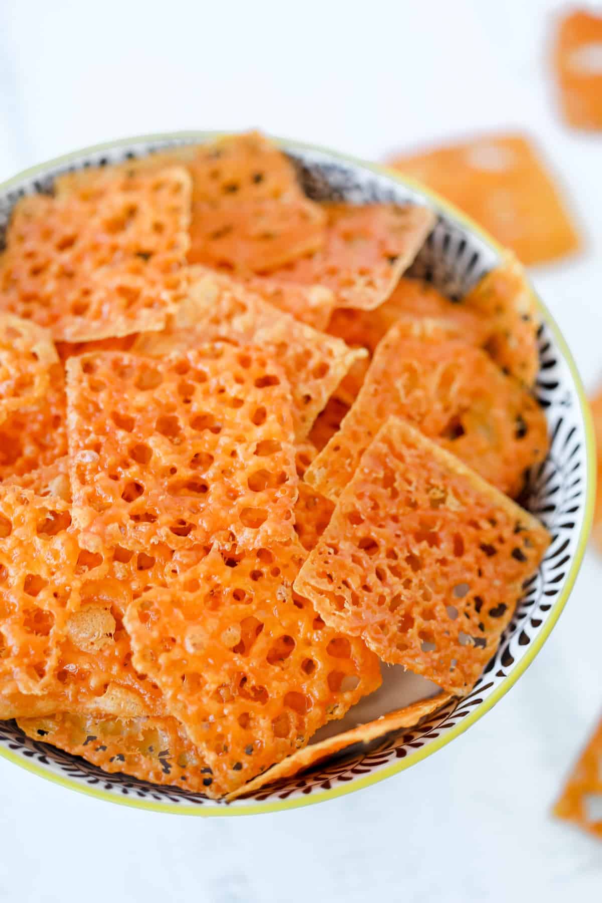 baked cheese slices in a bowl ready to snack on