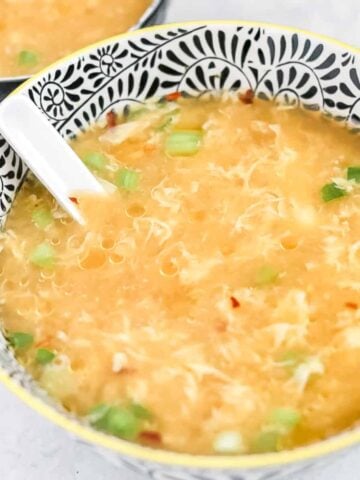 the simple gluten free egg drop soup no corn starch recipe in an asian bowl ready to eat