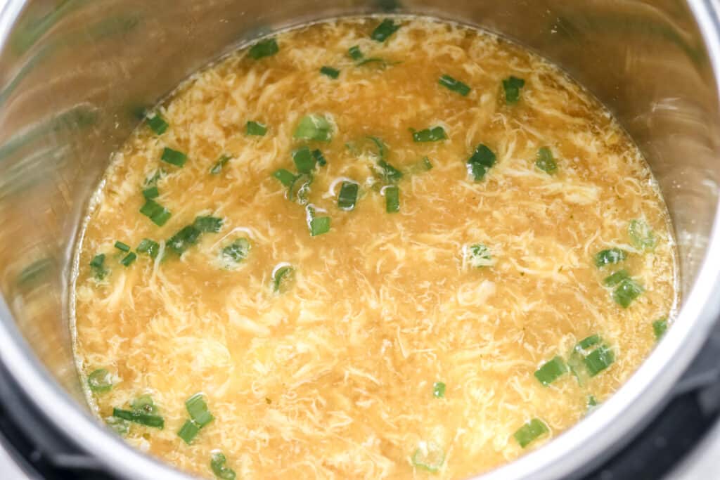 low carb egg drop soup recipe in a pot after stirring in the eggs
