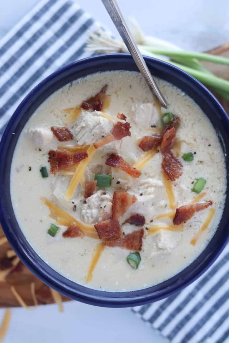 bacon chicken soup in a blue bowl