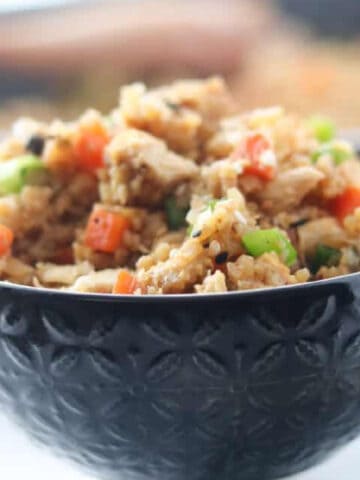 fried riced cauliflower piled up in a bowl