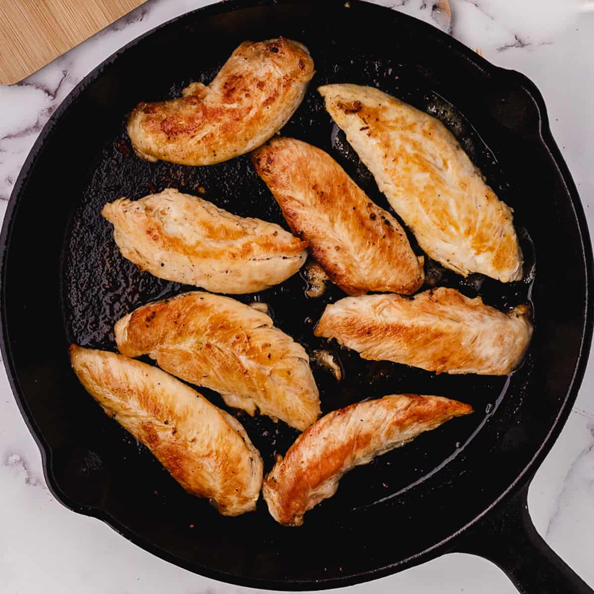 brown the chicken strips on both sides in the skillet
