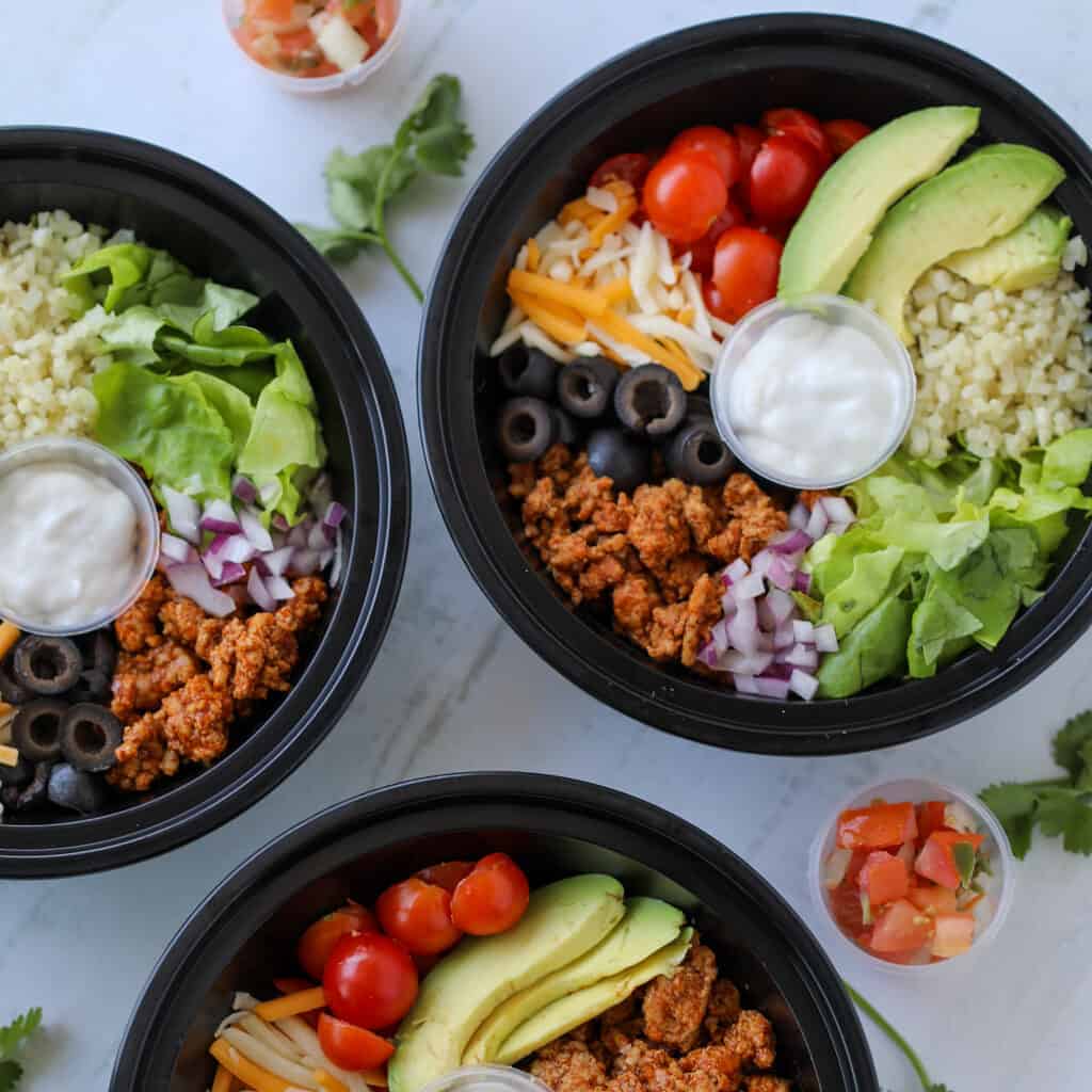 ground turkey taco bowl in meal prep containers