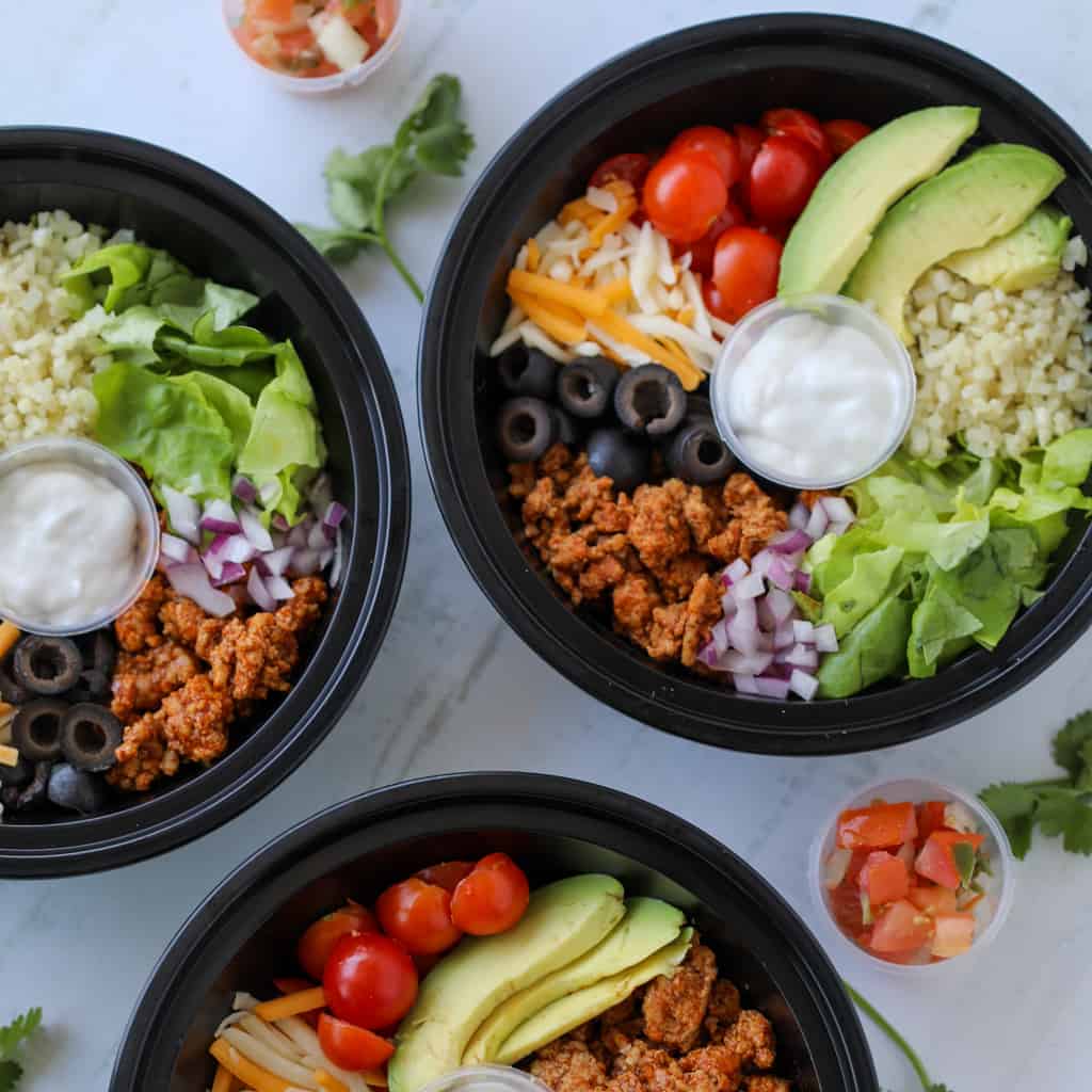 ground turkey taco bowl in meal prep containers