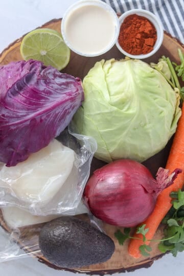 ingredients for fish taco salad in a bowl