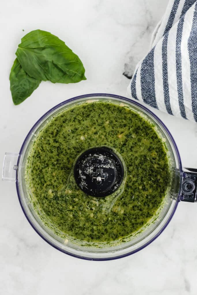 pesto with zucchini noodles in a food processor