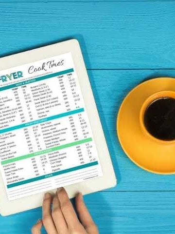 air fry cook times pdf on ipad with cup of coffee