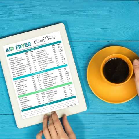 air fry cook times pdf on ipad with cup of coffee