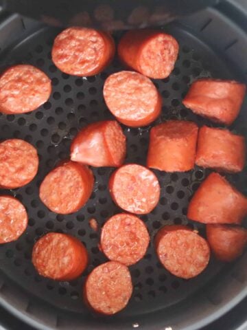 air fryer kielbasa cooked in the pot looking down view