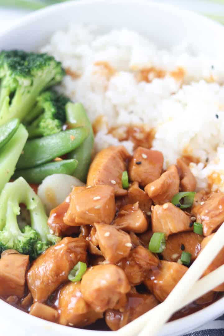 chicken teriyaki bowls with rice and chopsticks