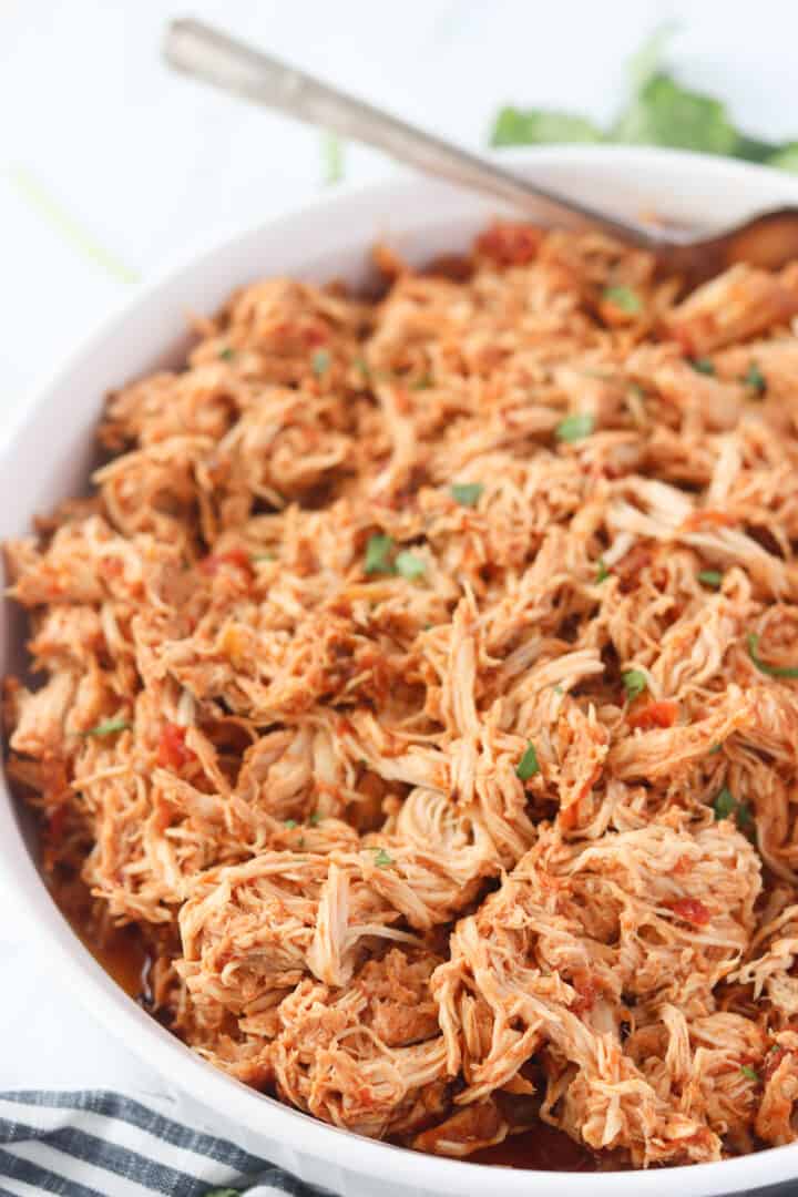 mexican shredded chicken slow cooker in a bowl ready to serve
