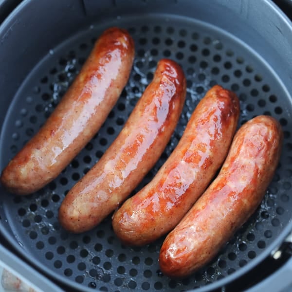 air fryer sausage cooked in a basket