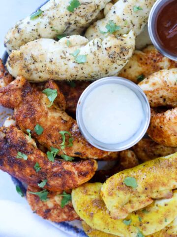 air fryer chicken tenders no breading on a plate and cooked