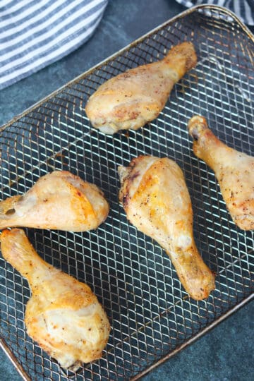 drumsticks on an air fryer baking rack