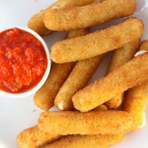a photo of mozzarella sticks air fryer frozen that have been cooked