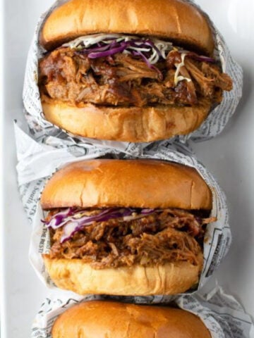 close up of pulled pork bbq sandwiches on a bun