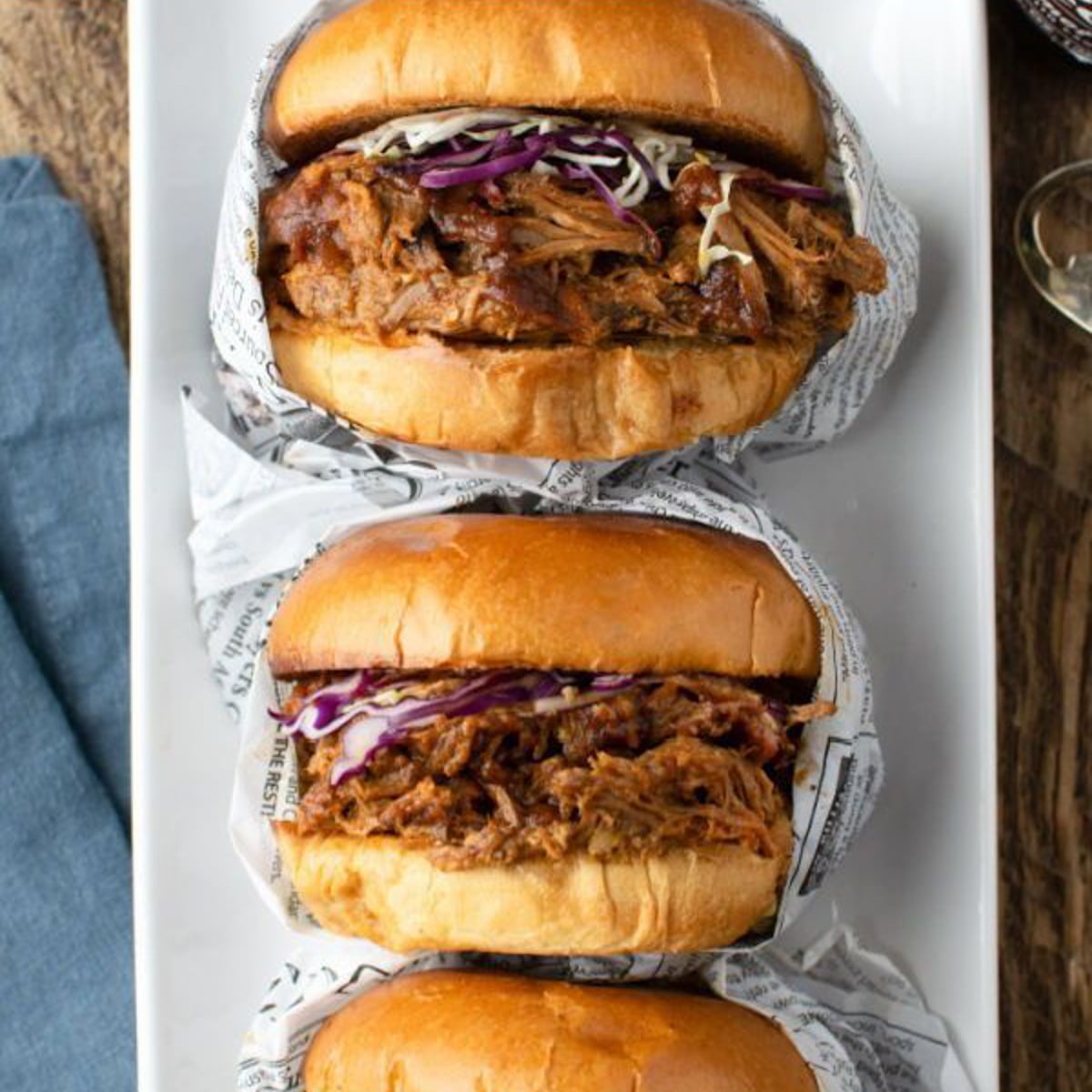 close up of pulled pork bbq sandwiches on a bun