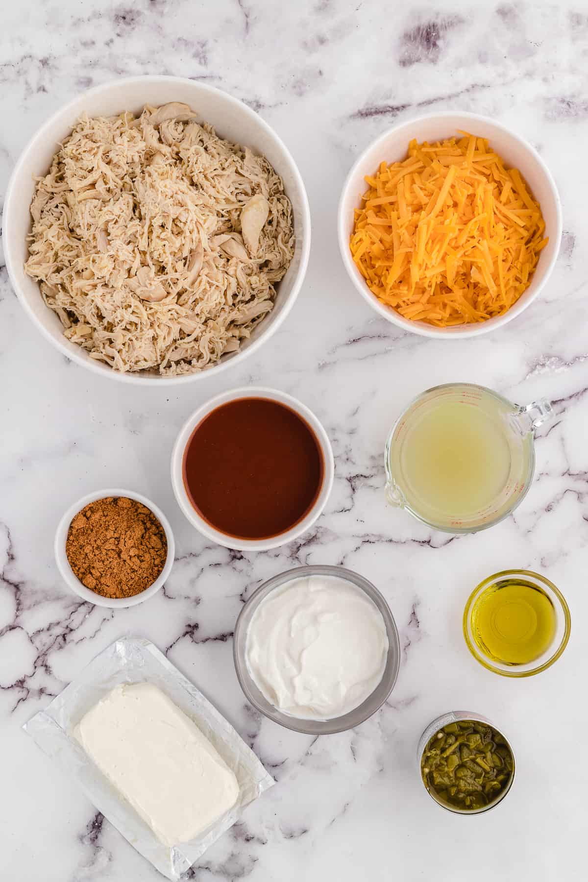 chicken enchiladas no tortillas ingredients image on marble background