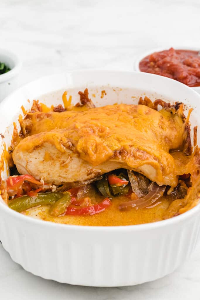 fajita bake with chicken in a white pan 