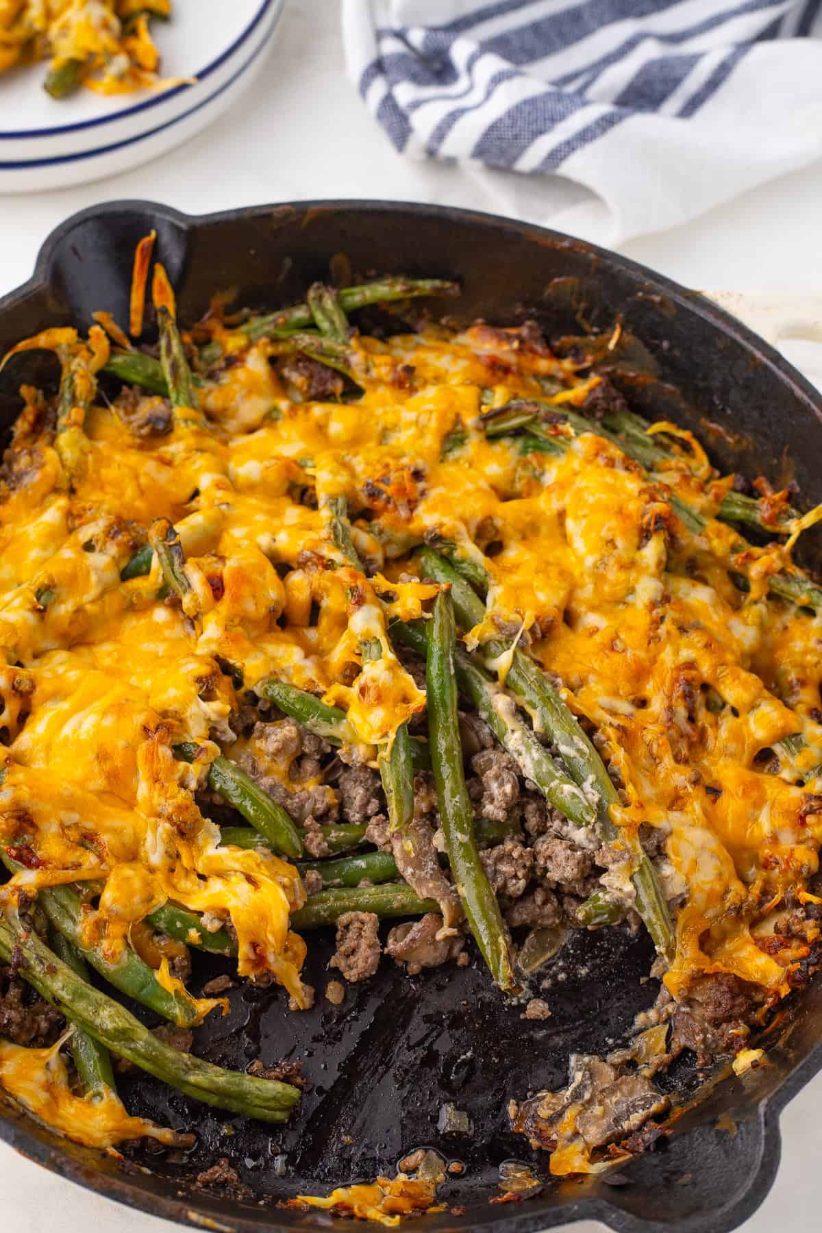 the hamburger casserole after cooking with a big scoop out of it