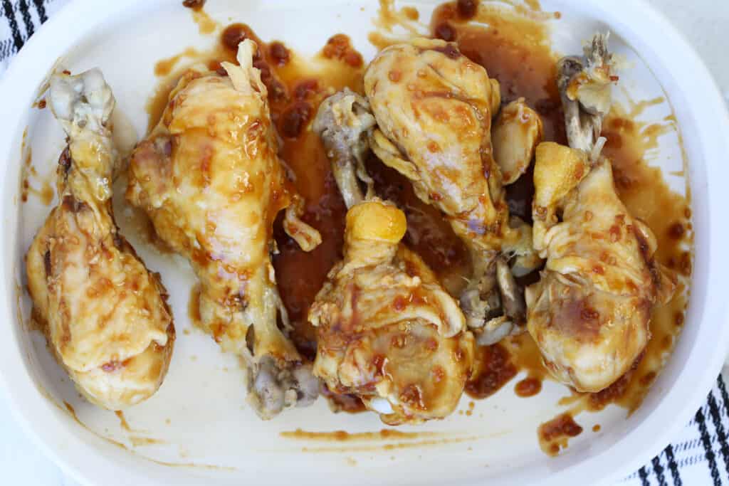 after making pressure cooker chicken legs brush them with sauce