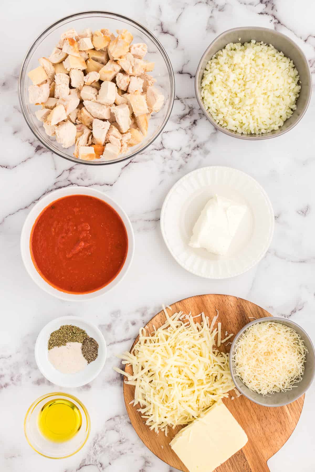 chicken parmesan casserole without pasta ingredients on a white background