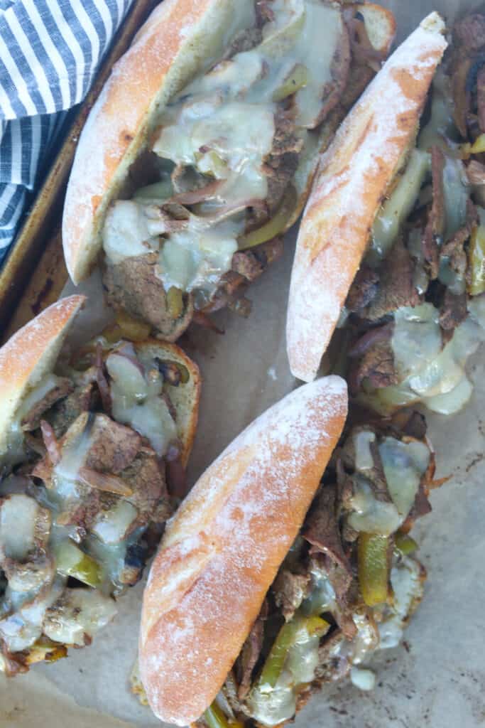 the Philadelphia cheesesteak recipe on a baking sheet after melting the provolone cheese