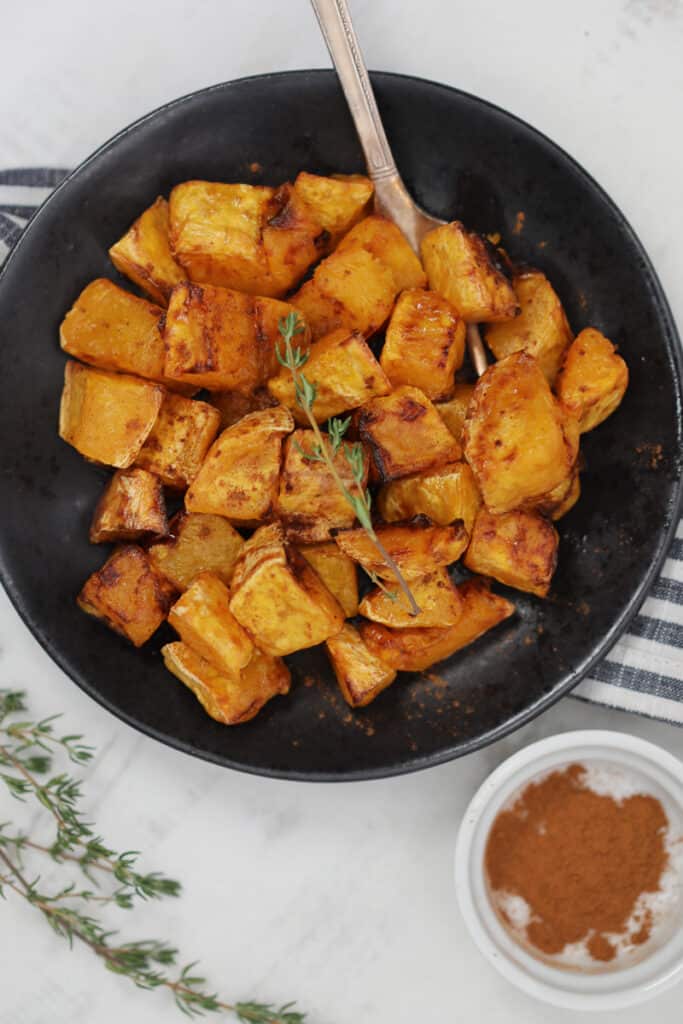 the butternut squash air fryer recipe in a black bowl