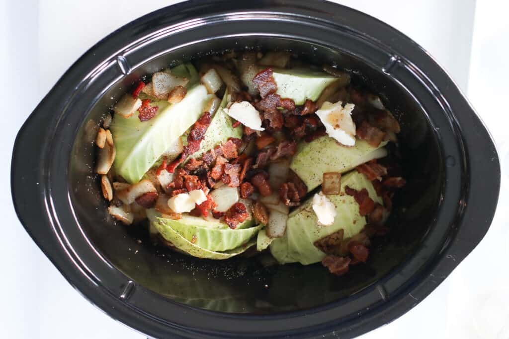 the cabbage in slow cooker image before cooking