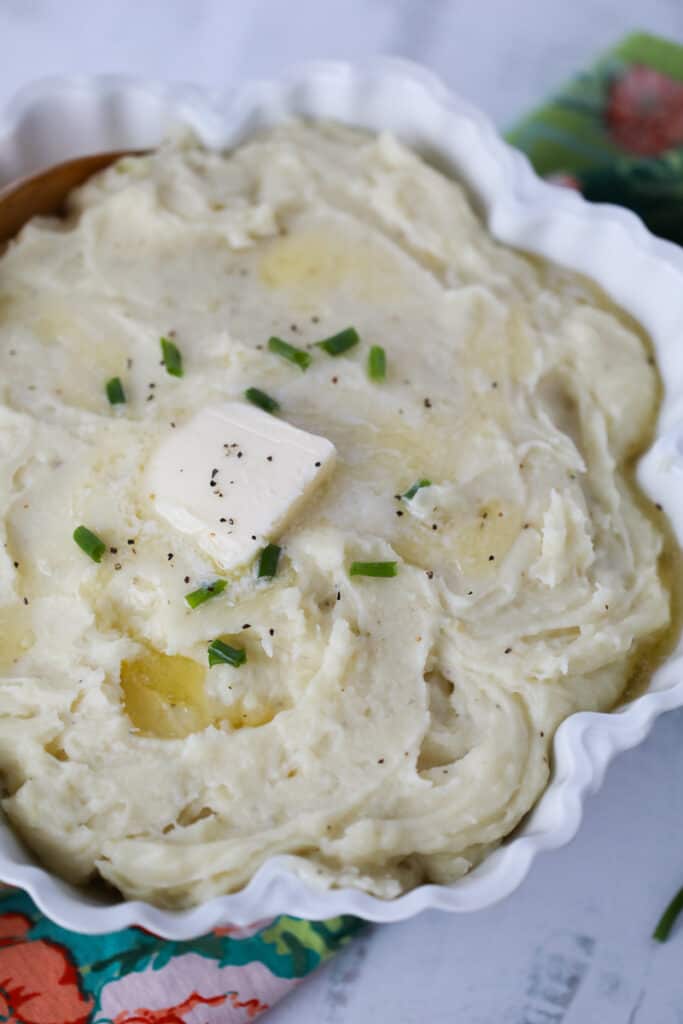 mashed potatoes in the instant pot in a white bowl