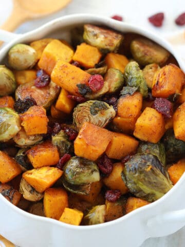 close-up of the roasted brussel sprouts and butternut squash in a serving dish