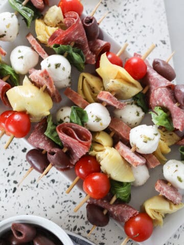 antipasto skewers recipe looking down on a white platter