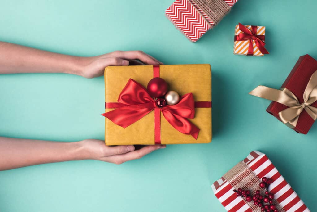 keto christmas gifts on aqua background
